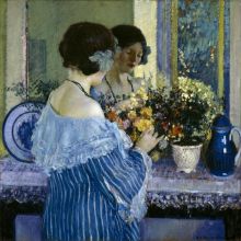 Girl in BLue Arrainging Flowers